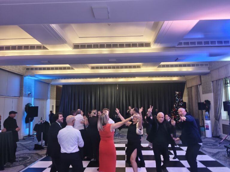 Guests dancing at a corporate gala awards dinner in London, DJ by Party Night London